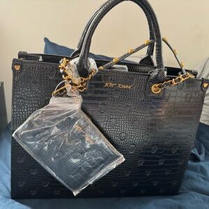 NEW BETSEY JOHNSON EMBOSSED SKULLS XOKIARA LARGE BAG purse